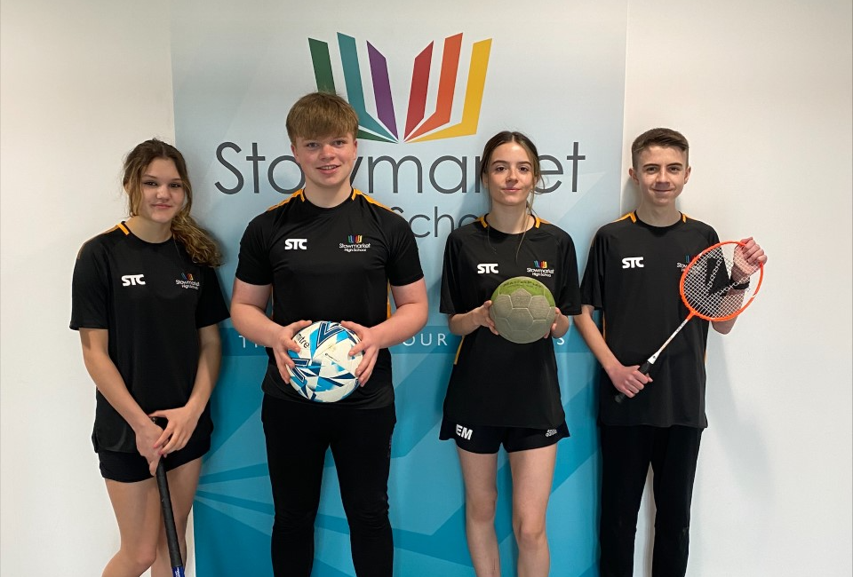 Students modelling our new multi sport kit